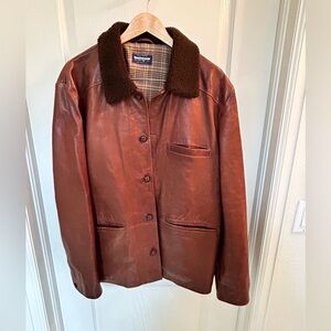 GUC men’s Guideboat Co. coat. Leather exterior with a w/trim collar. Size XL
